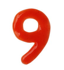 Number 9 written with red sauce on white background