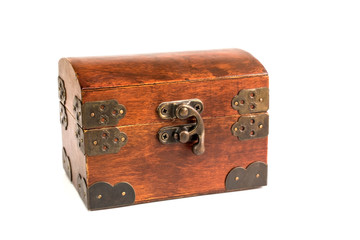 Closed wooden box for storing jewelry on a white background