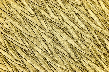 Abstract textured background of luxury gold fabric 