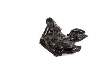 Macro stone mineral meteorite tektite on white background