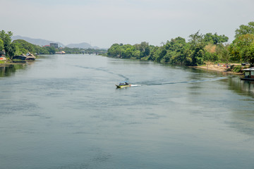 People as tourists in the speed boat in the river