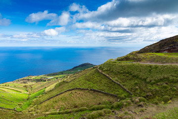 Hill of farm fields in the Corvo island in Azores, Portugal.