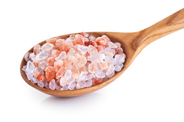 Wooden spoon with himalayan pink salt isolated on white background. - obrazy, fototapety, plakaty