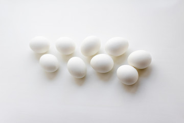 Fototapeta na wymiar white chicken eggs on white background