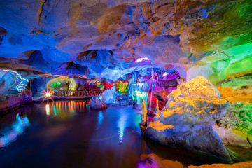 The beautiful Seven Star cave with colorful lights and reflection at Seven-star Crags Scenic Area