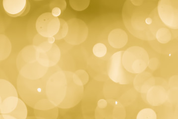 abstract golden background with light bokeh effect