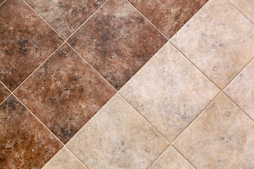 Real  brown and beige floor tile pattern for background. Pavement outdoors in shades of grey