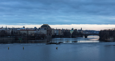 Fototapeta premium A view of Prague city scape with Charles bridge and Vltava river