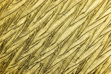 Abstract textured background of luxury gold fabric 