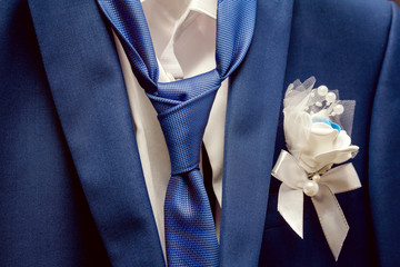 tie and boutonniere groom