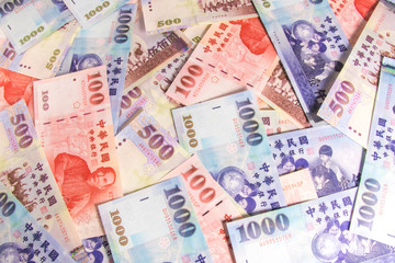 Fototapeta na wymiar Background of New Taiwan Dollar 1000, 500 and 100, Spread of Taiwan note.