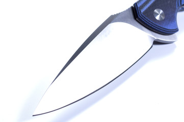 The blade of the knife at an angle on a white background. © vzwer