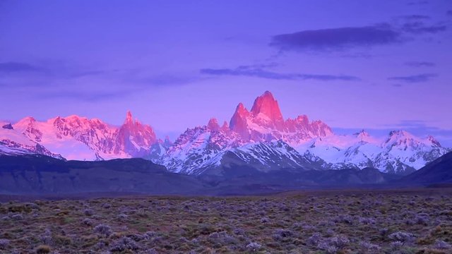 EL CHALTEN, ARGENTINA. Iconic panorama of Patagonian mountain range in Argentina. Amazing sunrise with vivid colors within remote terrain.