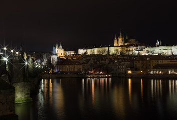 Fototapeta na wymiar A view of Prague city scape with Charles bridge and Vltava river
