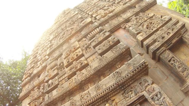 ancient figured bas-reliefs on old hindu temple of Parashurama sun shines Bhubaneswar Odisha