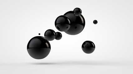 3D image of black balls in space. Balls of different sizes isolated on white background. Abstract, futuristic image of contrast of black and white. 3D rendering, illustration.