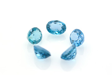 Group of beautiful and bright blue london topaz. Gems and precious jewels