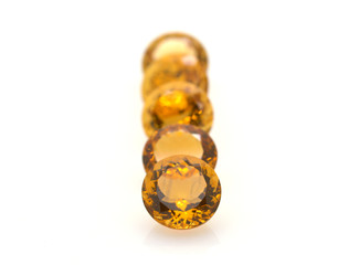 Group of precious yellow citrine gems polished and shiny. Stones and jewels