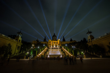Fototapeta na wymiar Magic fountain light show at night in Barcelona
