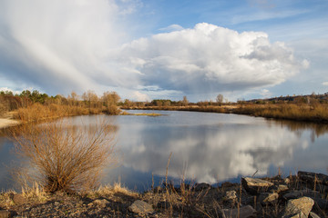 river reflected beautiful clouds