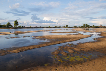 shallow river reflection of the sky