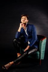 Fashionable stylish serious minded brutal young man