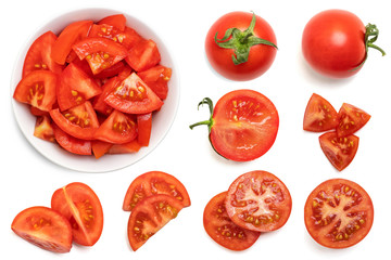 Set of fresh whole and sliced tomatoes isolated on white background. Top view
