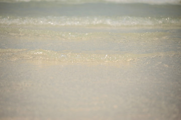 Small waves lapped the beach