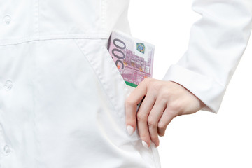 money in the pocket of doctor