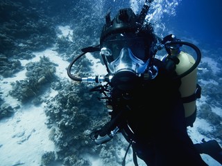 Scuba diver descending to the bottom
