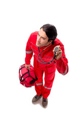 Young paramedic in red uniform isolated on white 