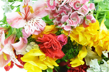 Obraz na płótnie Canvas bouquet of colorful flowers and background