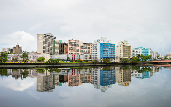Recife, Brazil - Circa April 2019: A view of the historic neighborhood Santo Antonio reflecting on the waters of the Capibaribe river