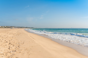 Fototapeta na wymiar The Meia Praia, in English, half beach, ist the most popular beach of Lagos. Meia Praia is one of the largest open bays in Europe
