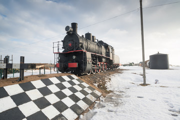 Old black train in The Historical and Cultural Complex Stalin Line in Loshany near Minsk, Belarus