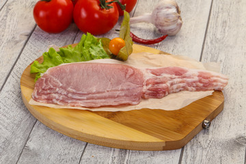 Raw pork bacon