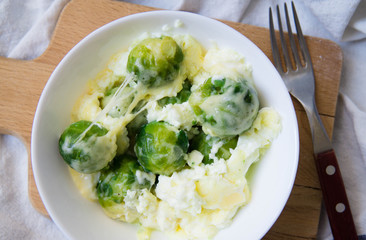 Brussel sprouts dressed with milk plus egg and cheese, omelette