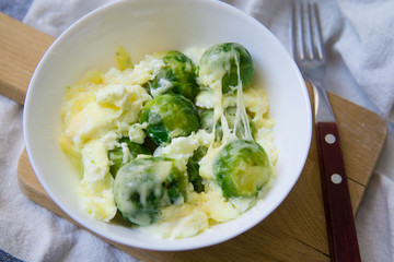 Brussel sprouts dressed with milk plus egg and cheese, omelette