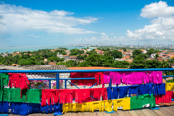 Viewpoint with colorful flags and Olinda and Recife's cityscape - Pernambuco, Brazil