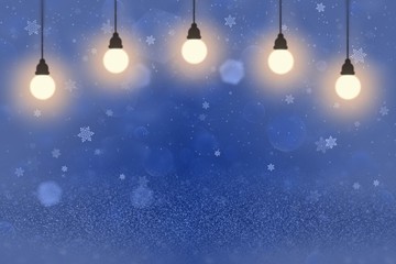 Fototapeta na wymiar blue pretty glossy glitter lights defocused bokeh abstract background with light bulbs and falling snow flakes fly, festival mockup texture with blank space for your content