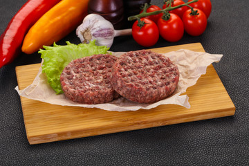 Raw burger cutlet