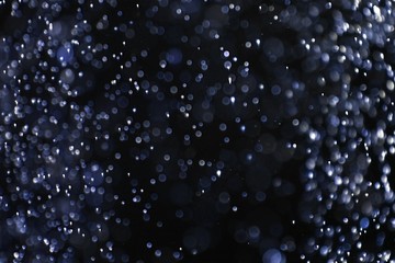 a lot of flying festival glitters bokeh texture - wonderful abstract photo background