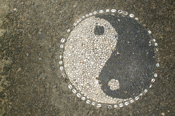 Yin-Yang Symbol made of little stone pebbles