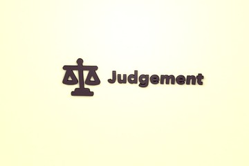 Illustration of Judgement with brown text on yellow background