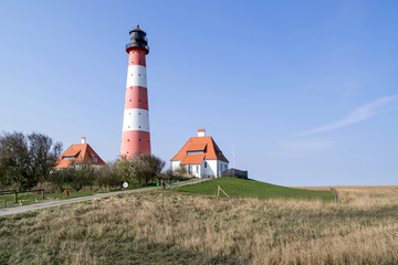 Fototapeta na wymiar Leuchtturm Westerheversand in Schleswig-Holstein, Deutschland