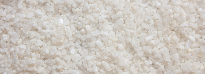 Salt white color full frame background, banner. Close up view