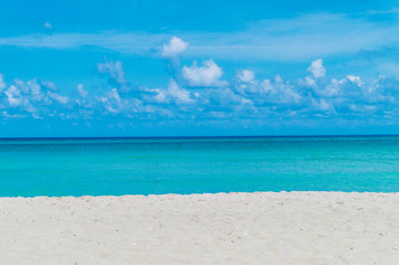 Fototapeta na wymiar White sand beach background.