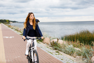 Fototapeta premium Young woman cycling