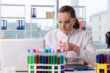 Female chemist working in medical lab 