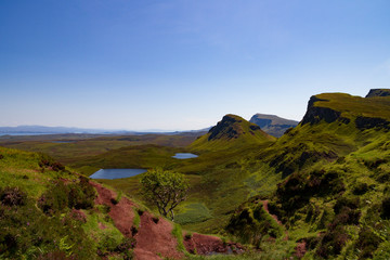 scottish landscape with mountains and clouds (Quiraing, Isle of Skye)